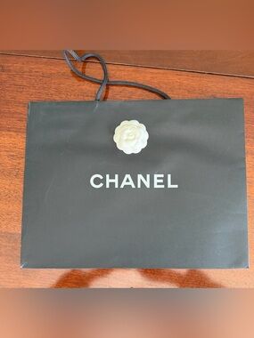 CHANEL Black Shopping Bag with White Camellia Accent